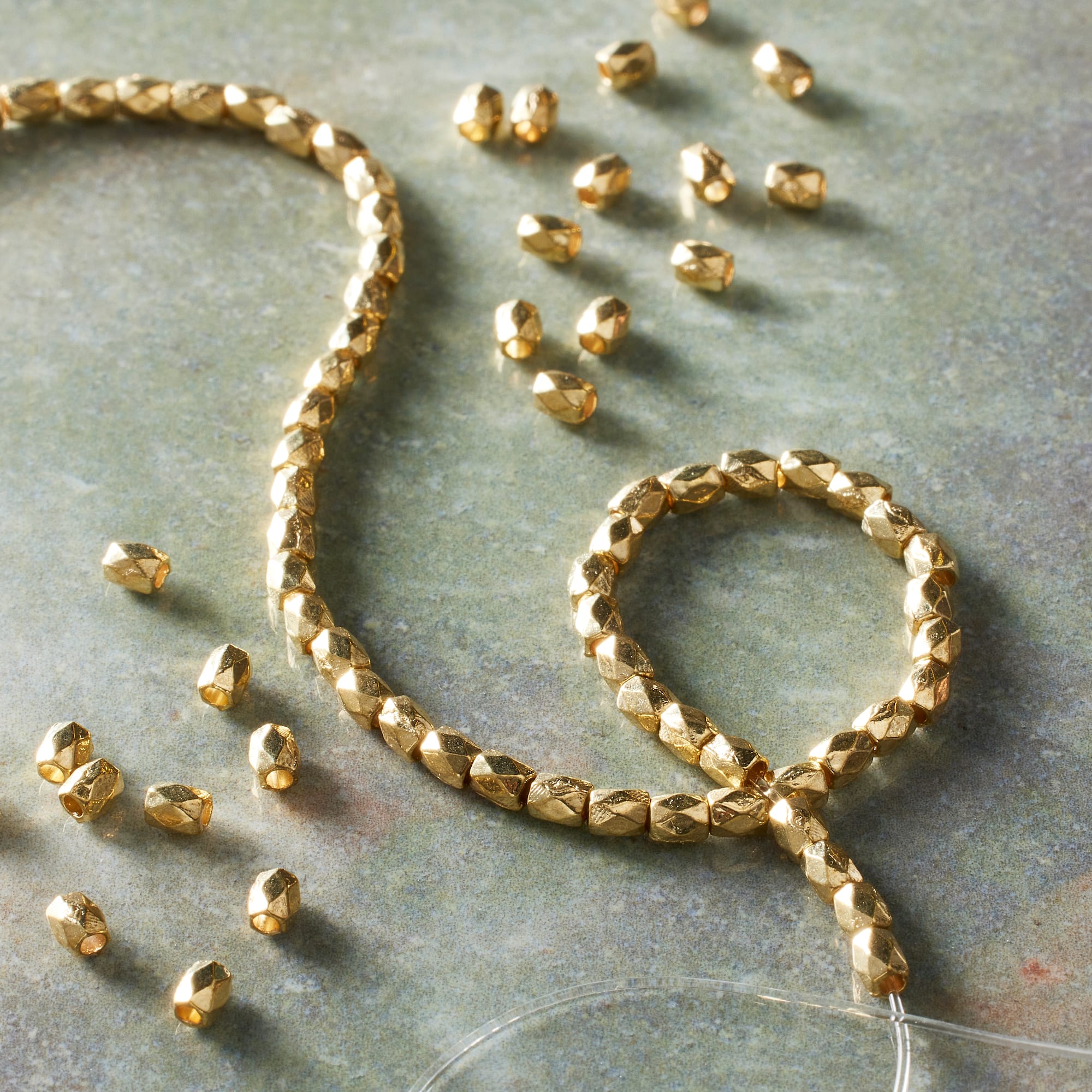 Hamilton Gold Metal Faceted Cube Beads by Bead Landing®, 3mm